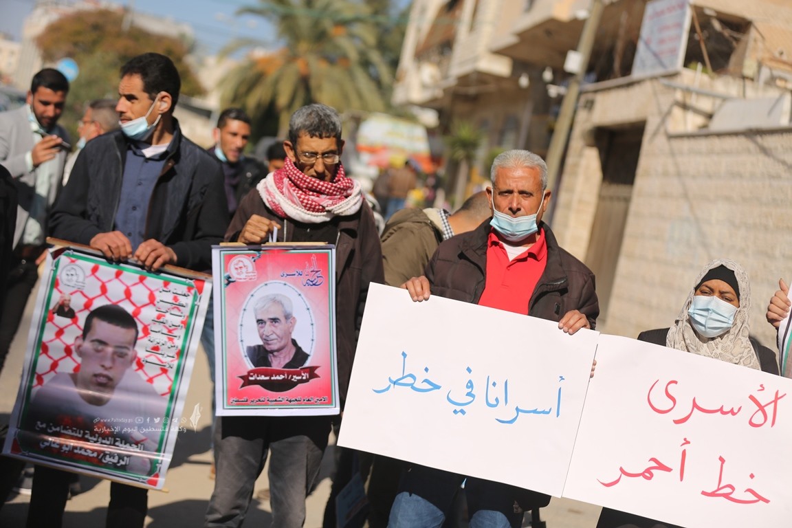 الأسرى والمحررين والشهداء والجرحى المقطوعة رواتبهم (14).JPG