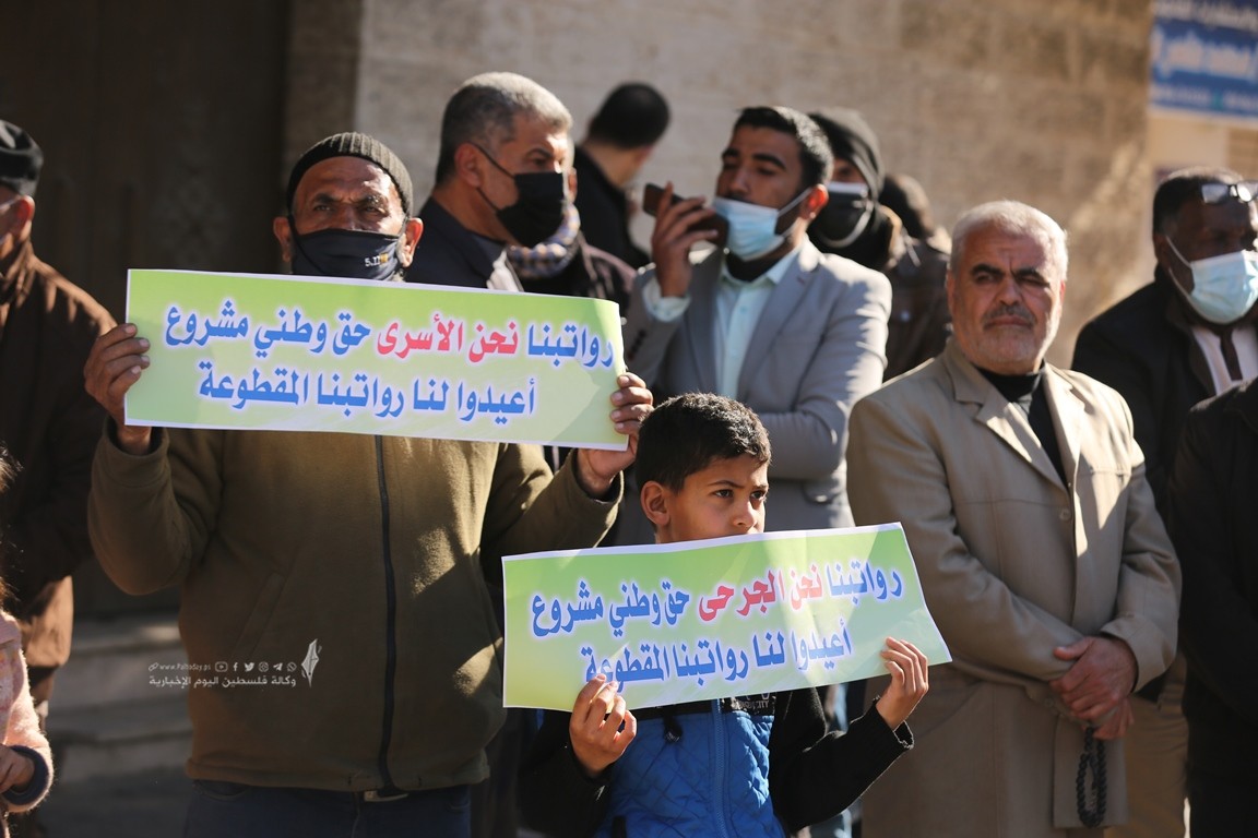 الأسرى والمحررين والشهداء والجرحى المقطوعة رواتبهم (7).JPG