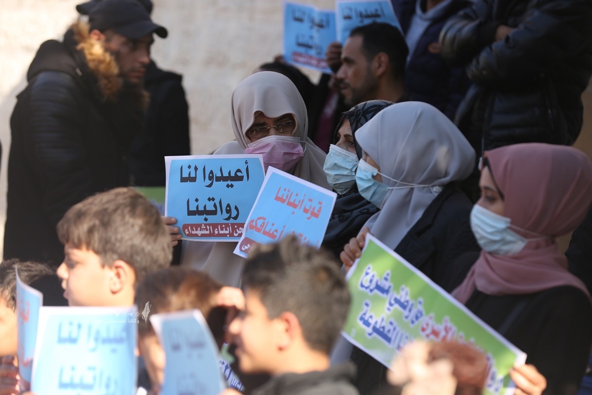 الأسرى والمحررين والشهداء والجرحى المقطوعة رواتبهم (9).JPG