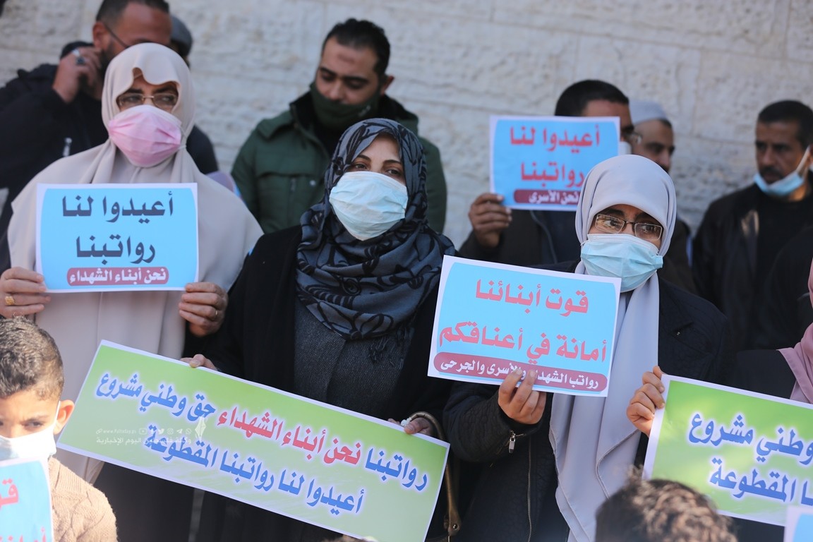 الأسرى والمحررين والشهداء والجرحى المقطوعة رواتبهم (5).JPG