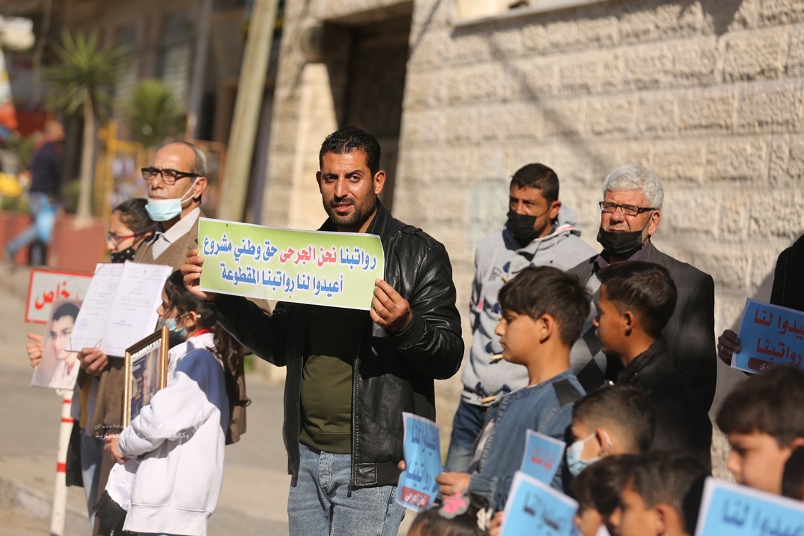 الأسرى والمحررين والشهداء والجرحى المقطوعة رواتبهم (8).JPG