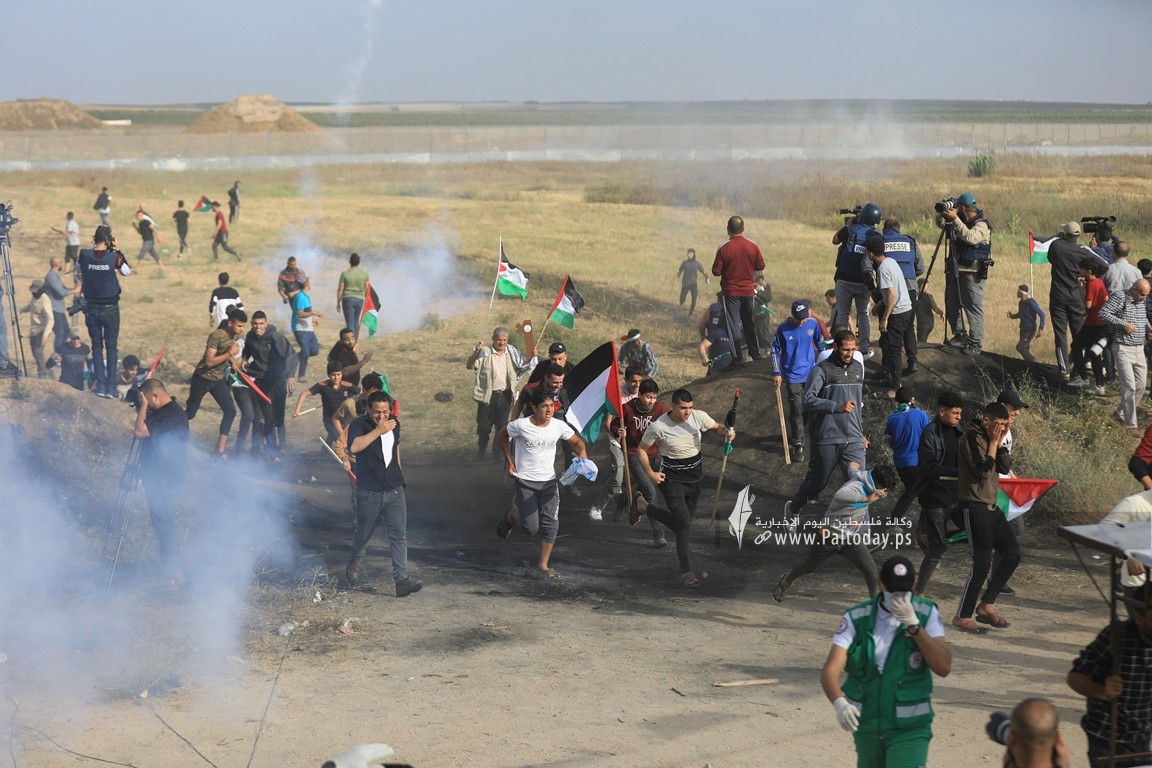 الاحتلال يقمع مسيرة العلم الفلسطيني شرق مدينة غزة (25).JPG