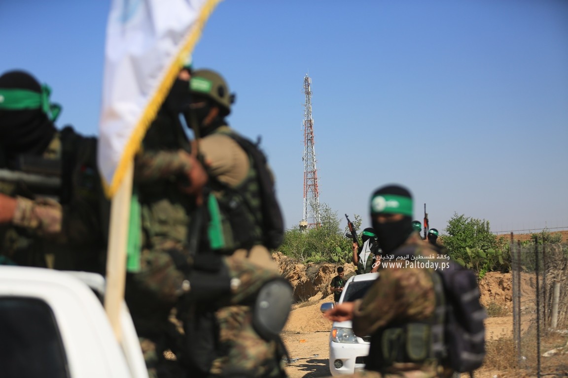 كتائب القسام تنظم عرضا عسكريا شرق المحافظة الوسطى تزامناً مع ذكرى عملية موقع أبو مطيبق العسكري (10).JPG