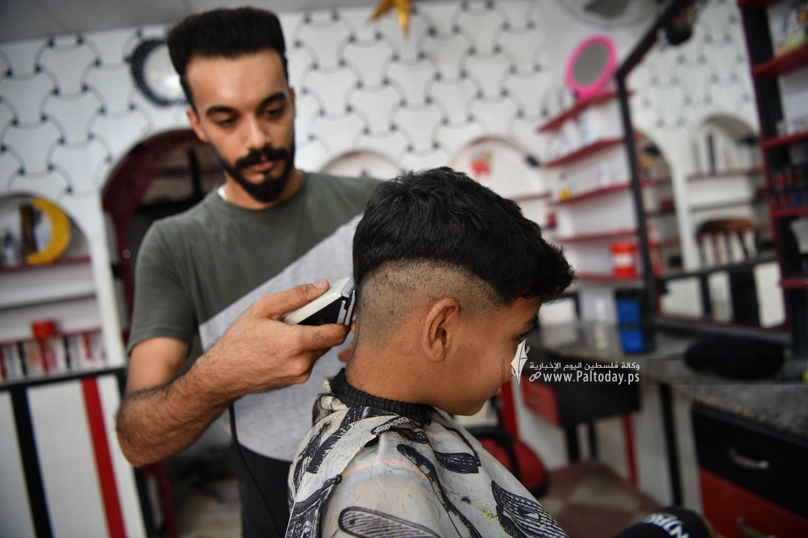 حلاقة مجانا (12).JPG